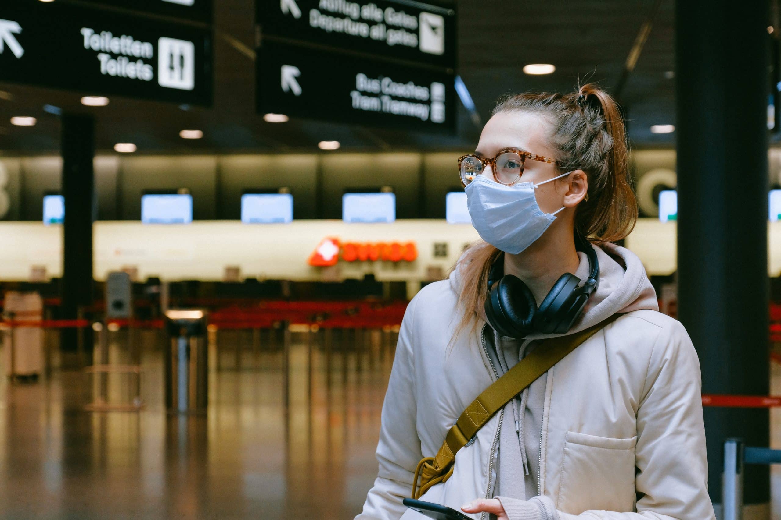 Women with mask at airport